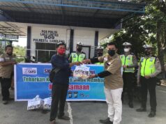 Jumat Berkah, SMSI Batam dan Polresta Barelang Bagikan Sembako ke Warga SMSI Kota Batam