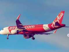 Air Asia Hentikan Jadwal Penerbangan Hingga 6 September Air Asia Hentikan Penerbangan