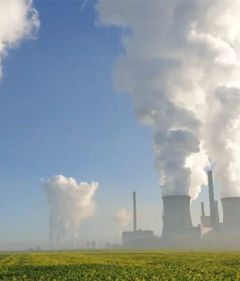 Kontroversi Pajak Karbon Di Indonesia: Upaya Selamatkan Bumi Atau Beban Bagi Industri? Ilustrasi Asap Pabrik